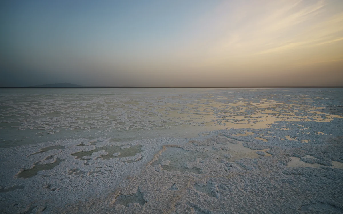 Lake Karum in the Afar Depression, Ethiopia, showing salt flats and arid terrain