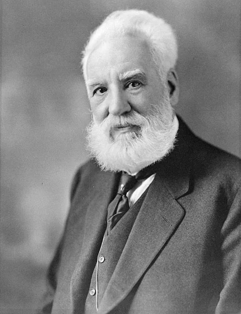 Portrait photograph of Alexander Graham Bell, the man who made the word telephone globally famous.