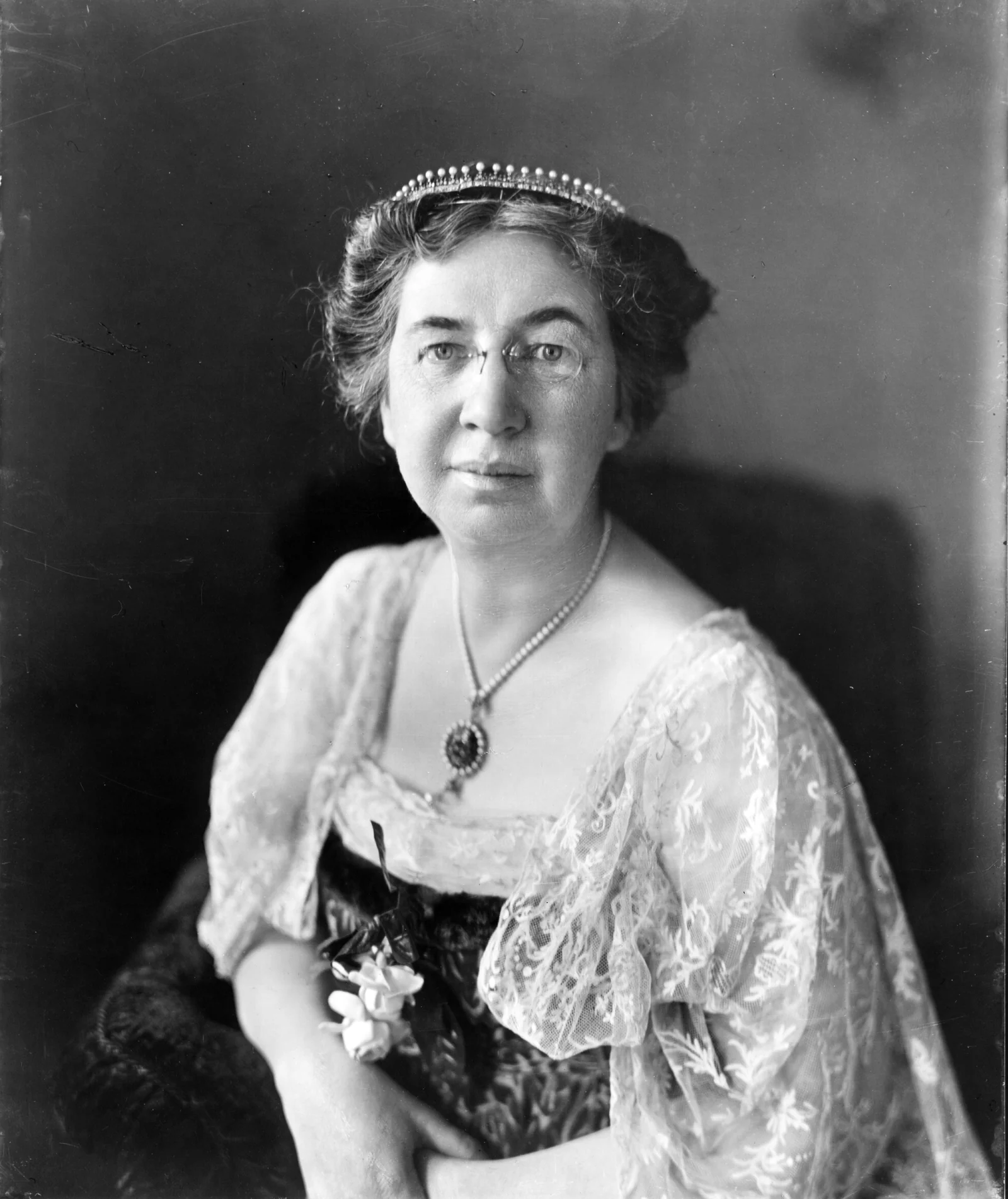 Portrait of Mabel Hubbard Bell, Alexander Graham Bell's deaf wife, seated facing front.