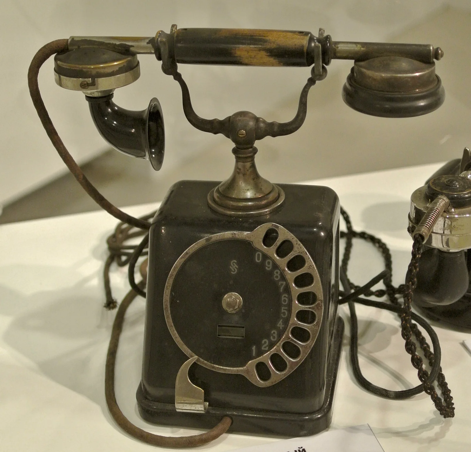 Vintage rotary dial telephone by Siemens and Halske, the archetypal mid-century phone.